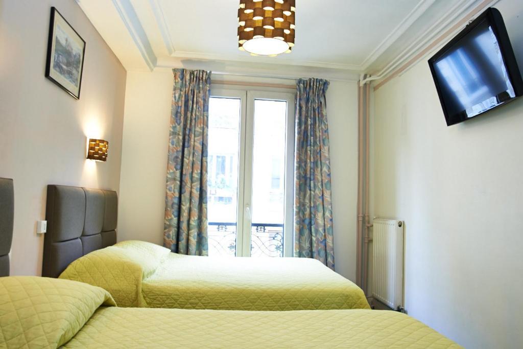 Hotel Luxor Issy-les-Moulineaux Oda fotoğraf